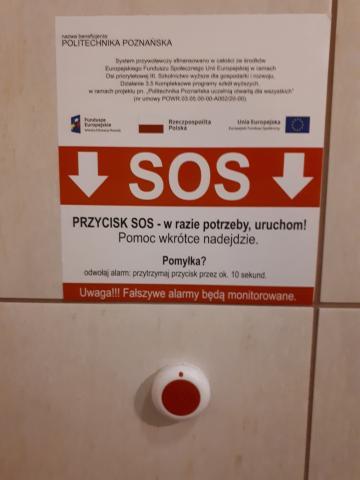 System przywoławczy w toalecie budynku A23. Przyciski i tabliczka informacyjna